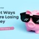 Pink piggy bank wearing sunglasses with text Quiet Ways You're Losing Money and How to Fix It for 2026 money-saving tips